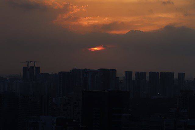 Cloudy sunset as seen from Meritus Club Lounge (Top of the M) Mandarin Orchard Singapore