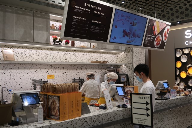 Cashier and cafe inside Wu Pao Chun Singapore