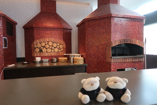 Traditional wood-fired brick ovens at Prego Fairmont Singapore