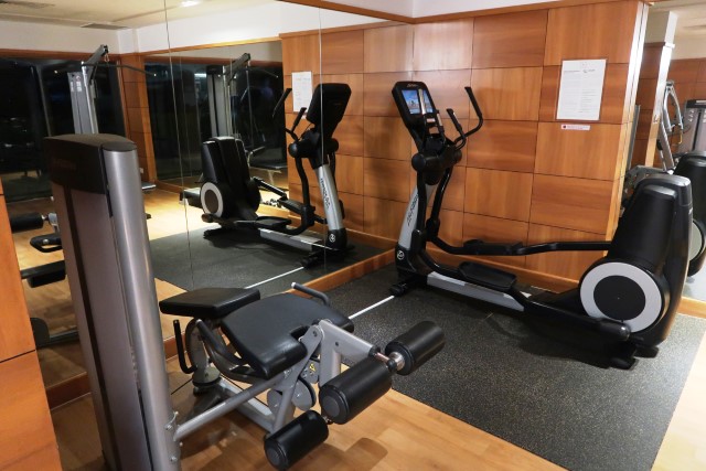 Weight machines and elliptical machine at Orchard Hotel Gym