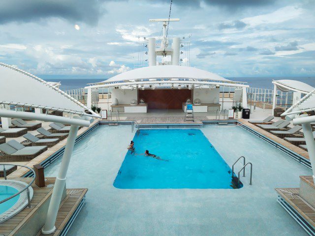 View of Dream Cruise Palace Swimming Pool from Palm Court at Deck 19