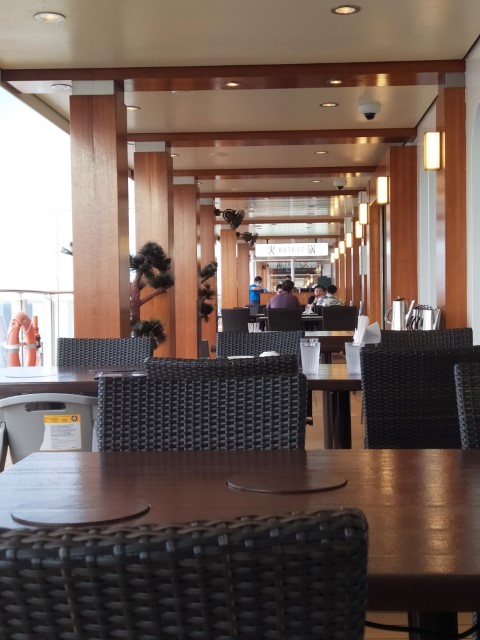 Tables along the board walk (Deck 8) of Hot Pot Restaurant Genting World Dream Cruises