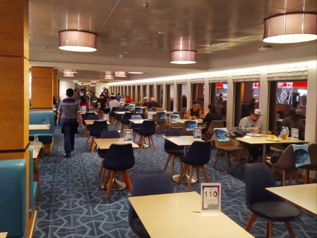 Seating area of the Lido for buffet onboard the World Dream Genting Dream Cruises