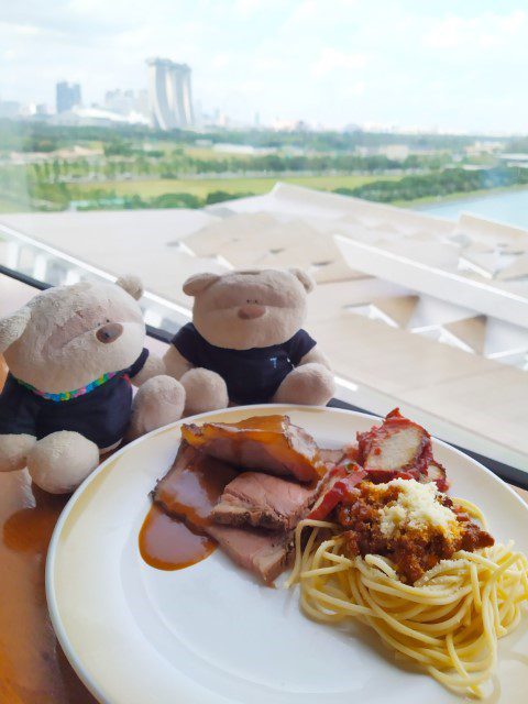 Windjammer boarding day lunch of char siew, spaghetti and views of Marina Bay Sands in the background