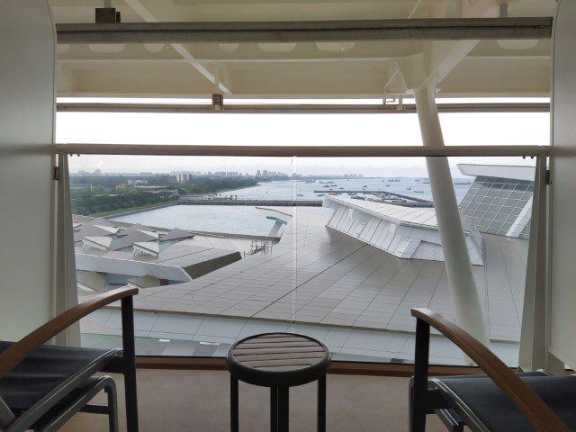 Partially obstructed balcony state room at deck 13 due to extension from deck 14 on Royal Caribbean's Quantum of the Seas
