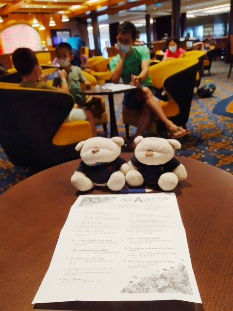 2bearbear playing Add-a-letter puzzle on Quantum of the Seas (Schooner Bar)
