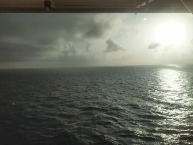 Sunrise as seen from Balcony State Room Quantum of the Seas Cruise To Nowhere