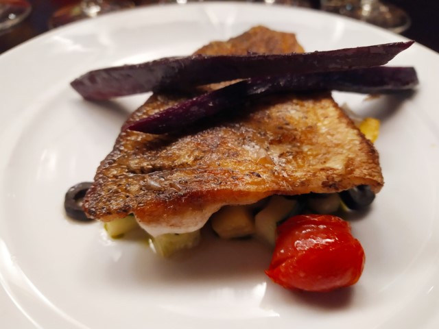Chef's Table Quantum of the Seas Review: Roasted Branzino (grilled zucchini, peppers, lemon confit, pesto)
