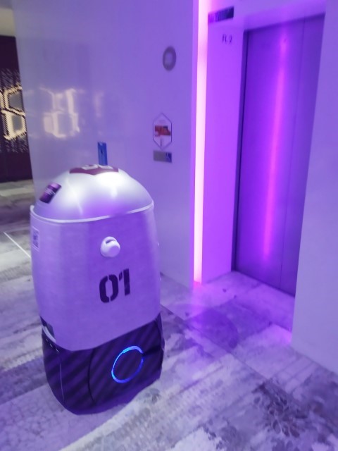 Yoshi robot waiting for the lift at Yotel Singapore