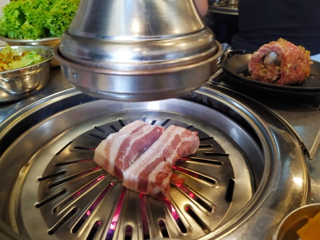 Black Pork Belly on the grill at Superstar K Korean BBQ Restaurant Review