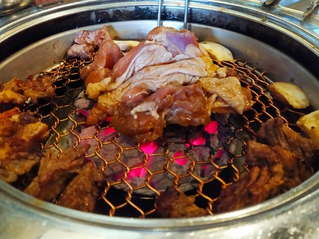 Seasoned Chicken on the grill at Super Star K Korean BBQ Restaurant Review