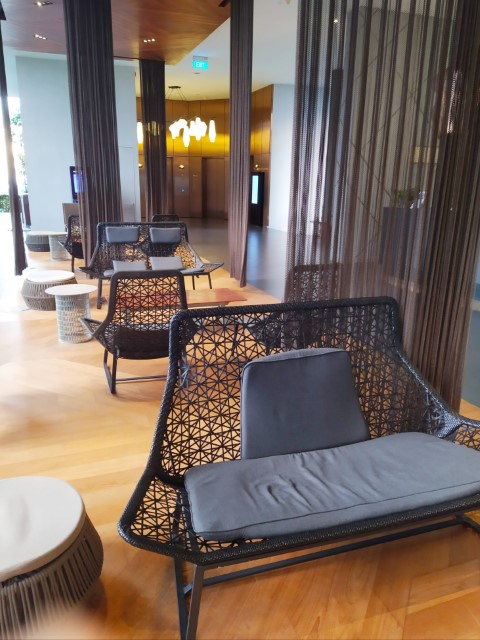 Comfortable seating areas at Level 12 of Oasia Downtown Staycation Review