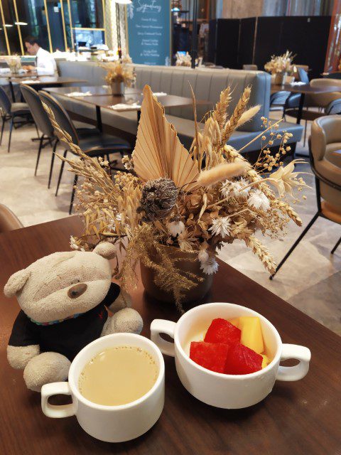 Fruits and coffee for breakfast at Oasia Hotel Downtown