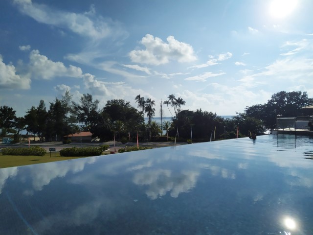 Reflection by infinity pool of Westin Desaru Coast Resort