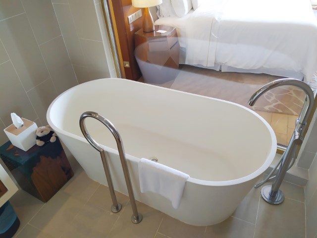 Large bath tub with sea views and TV views in Premier Sea View room Westin Desaru