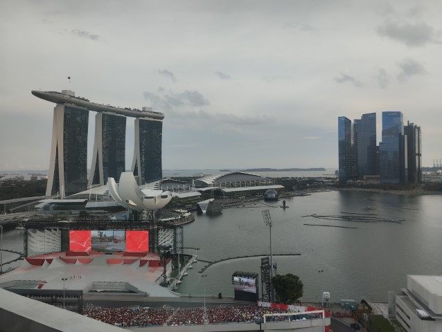 Can you spot one of the Red Lions above MBS about to land at the Float @ Marina Bay?
