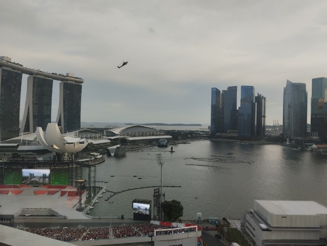 Vertical ascent of helicopters at Marina Bay - seen from Mandarin Oriental Singapore Marina Bay View Room