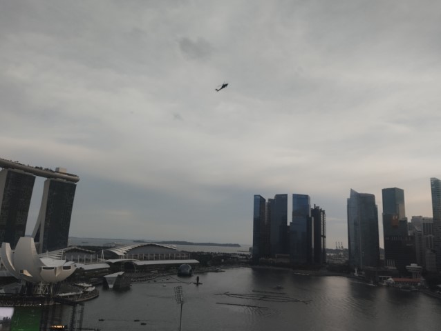 Further Vertical ascent of helicopters at Marina Bay - seen from Mandarin Oriental Singapore Marina Bay View Room