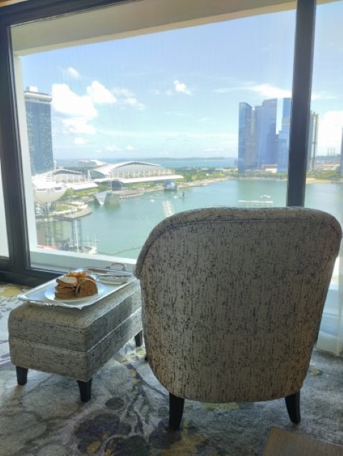 Enjoying views of Marina Bay from Mandarin Oriental Singapore Hotel