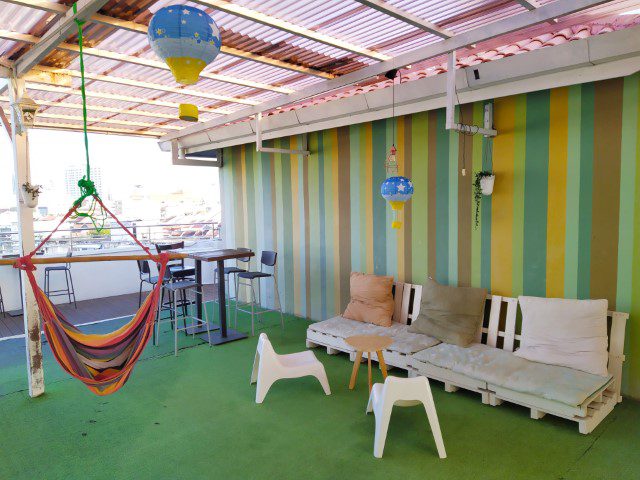 Hammock and wooden furniture at roof top of Armenian Street Heritage Hotel