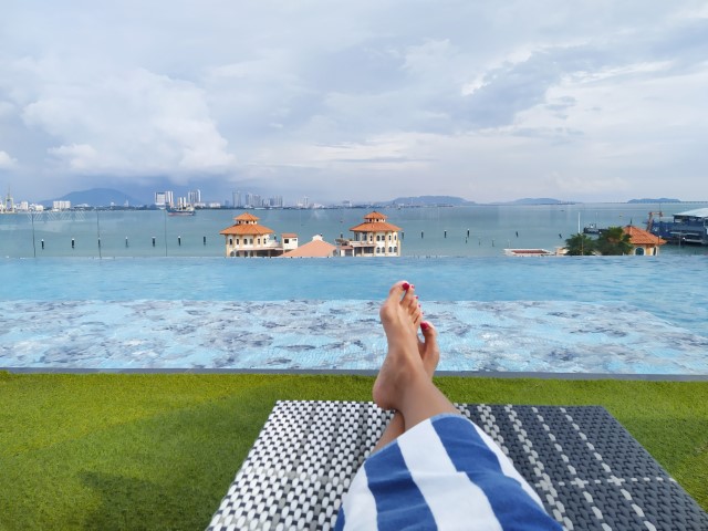 Enjoying the views out to Peninsula Malaysia from Prestige Hotel Penang Roof Top Infinity Pool