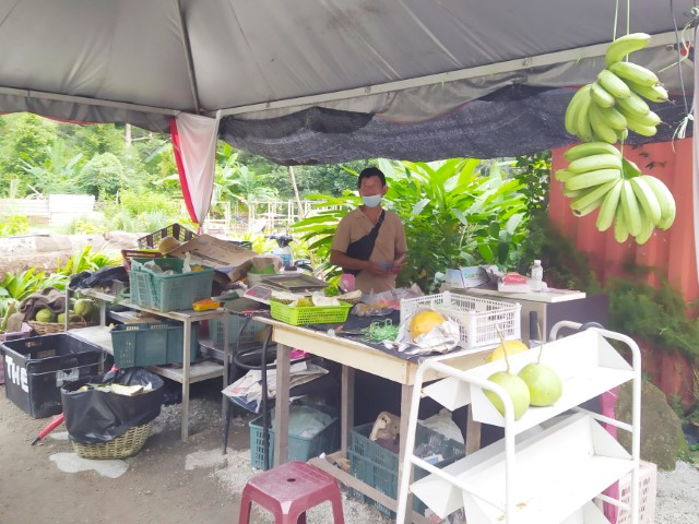 Fruit stall that sells durian straight from the plantation at 2 Acres Cafe Penang