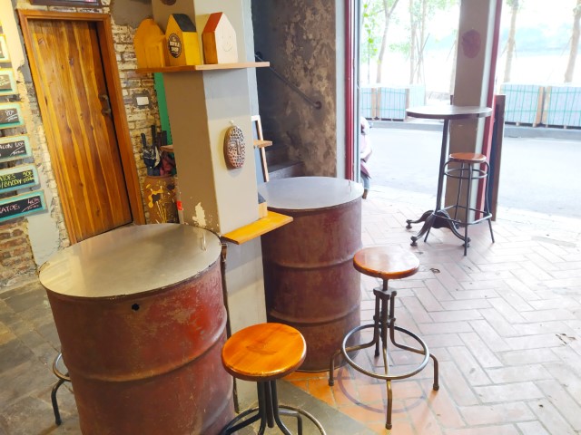 Standing Bar tables up-cycled from barrels at level 1