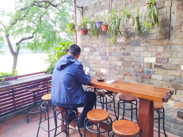 Standing Bar Hanoi Outdoor Seats at Level 2 with some greenery