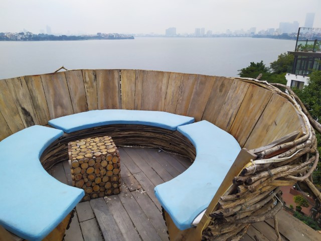 Circular seats right at the top of Tree Bee Coffee Hanoi that overlooks Lake Ho Tay