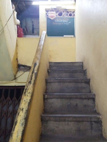 Narrow flight of staircase leading to Cafe Dinh Hanoi Egg Coffee