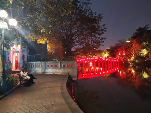 Iconic red brige "The Huc" that cross Hoan Kiem Lake in Hanoi - notice the beautiful reflections Kate caught