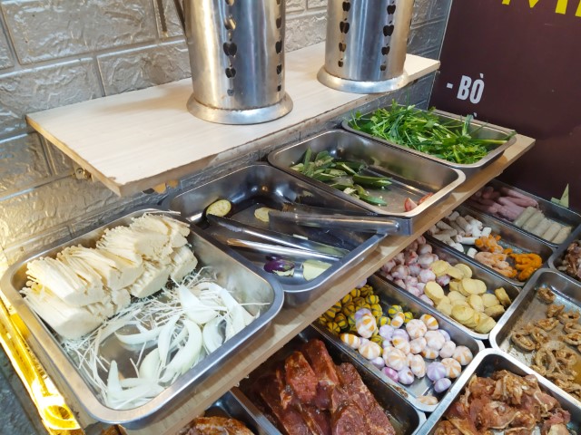 Hanoi Roadside BBQ Buffet also includes sweet onions, green onions, lettuce, sotong balls and more!