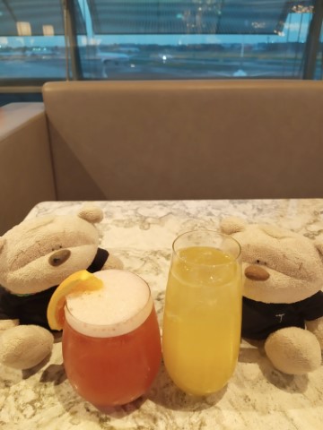 Sunset Cocktails of SilverKris Sling and Singapore Sling at Open Concept Area Business Class SilverKris Lounge Singapore