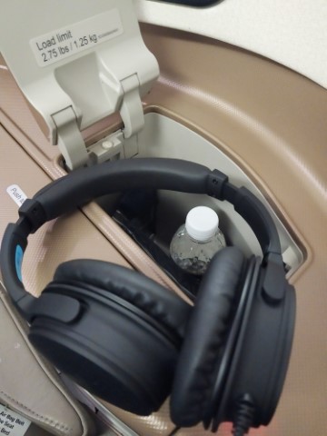 SQ Business Class Airbus A380-800 - Earphones and bottle of water