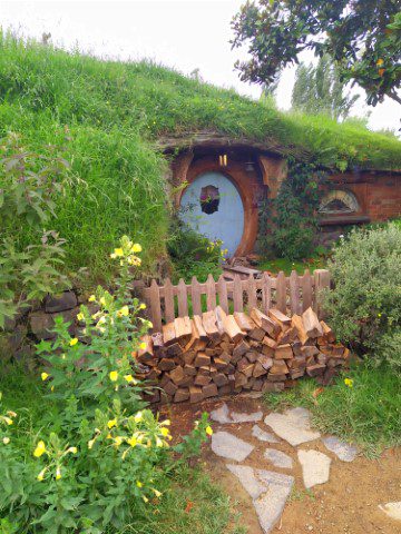 Hobbit Hole at Hobbiton where cut wood is outside - looks like it is still habited 