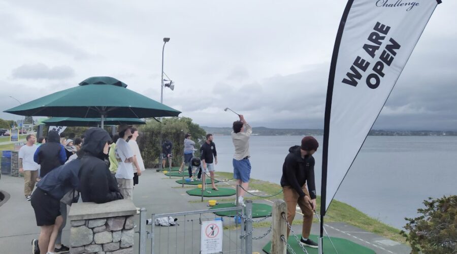 Visitors trying out the Hole-In-One Challenge at Lake Taupo