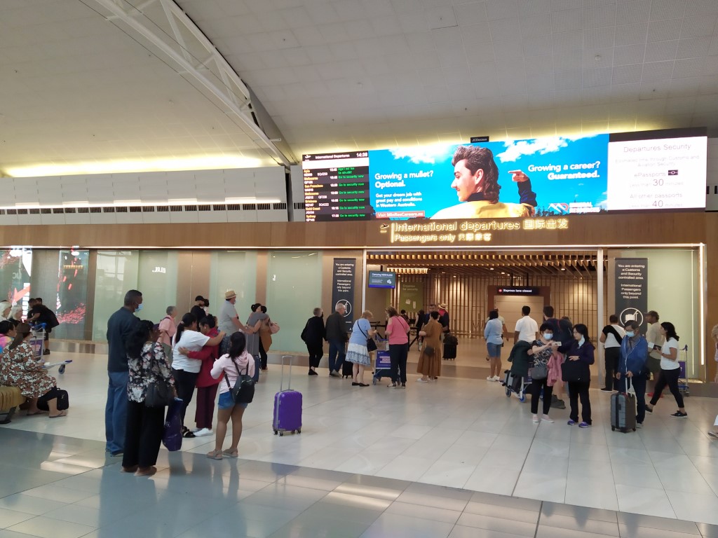 International Departures at Auckland Airport with Food Court nearby