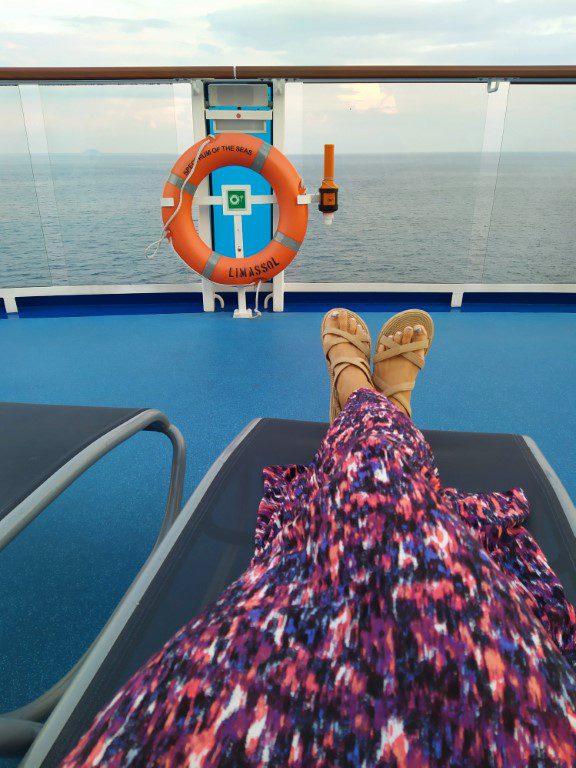 Kate decking out while Tom exercised on Spectrum of the Seas Royal Caribbean Cruise (aft of deck 15)