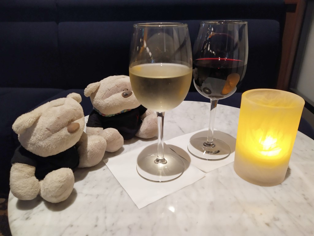 Having Chardonnay and Cabernet Sauvignon at Vintages Wine Bar Spectrum of the Seas