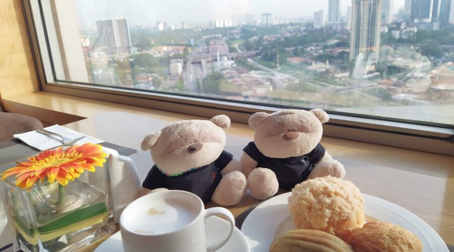 DoubleTree Hilton Johor Bahru Executive Lounge Breakfast Review - 2bearbear enjoying coffee and pastries with a view