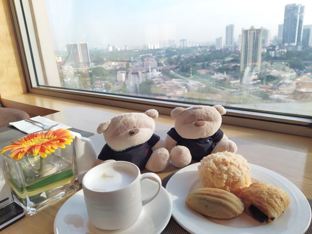DoubleTree Hilton Johor Bahru Executive Lounge Breakfast Review - 2bearbear enjoying coffee and pastries with a view
