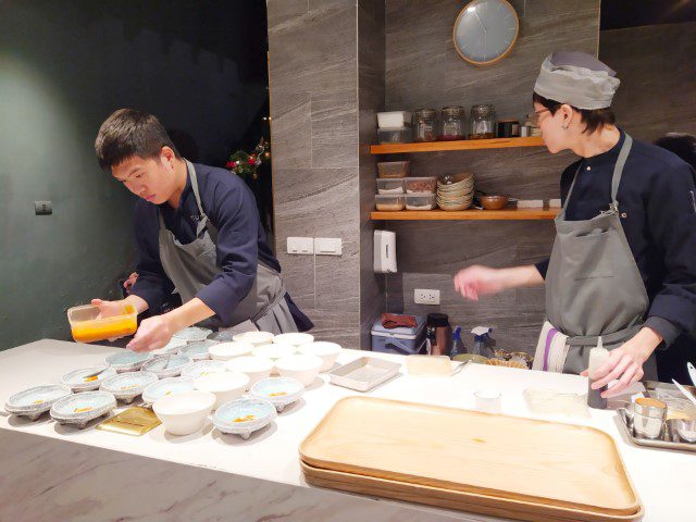 Chefs hard at work at open-kitchen of TUNG Dining Hanoi