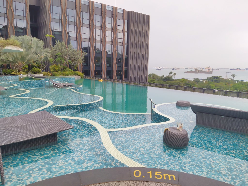Pamukkale Pool Outpost Hotel Sentosa that overlooks the Singapore Straits