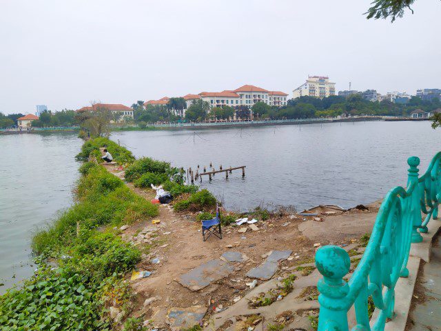 Same short cut with people fishing at Ho Tay Lake Hanoi