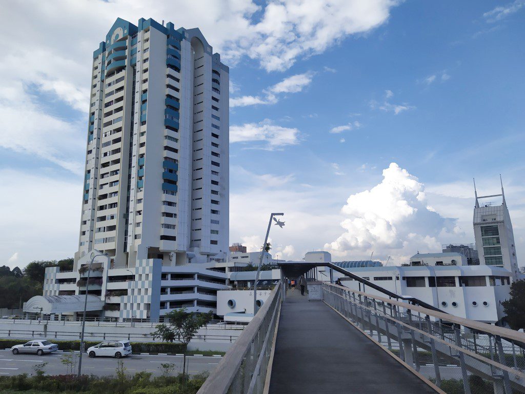 Crossing the bridge from Beauty World MRT Station to Rifle Range Nature Park