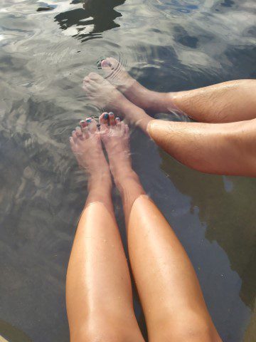 Kate and Tom enjoying the free foot bath at Rotorua Kuirau Park