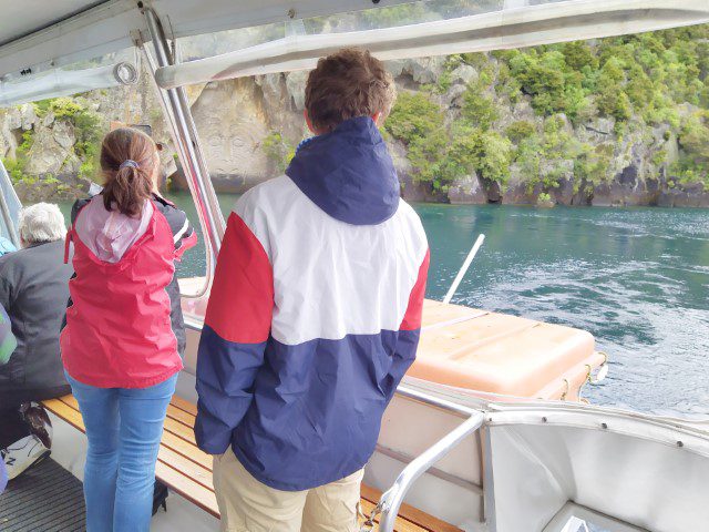 Cruise boat rotates at Maori Cave Carving for all guests to have a view of the carvings