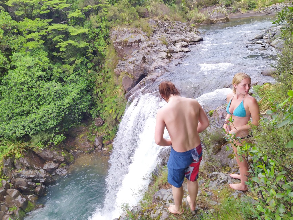 Kids taking the plunge at Tawhai Falls (aka Gollums Pool) NZ