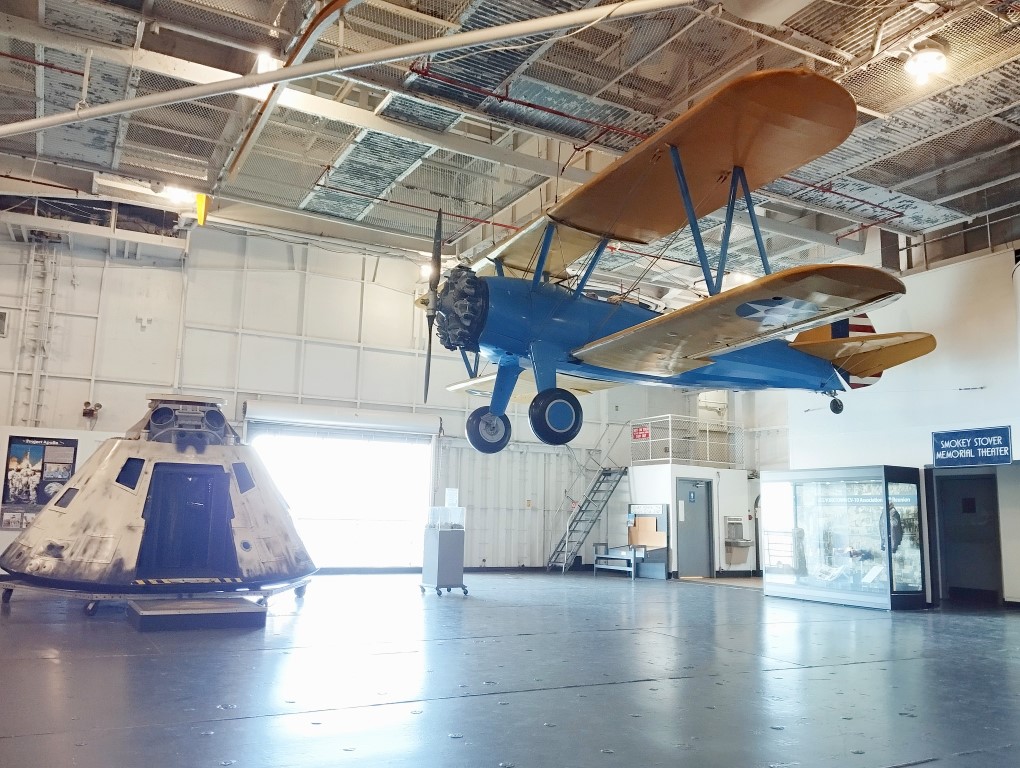 Historic aircrafts and info on space programme in hangar of USS Yorktown at Patriots Point Museum