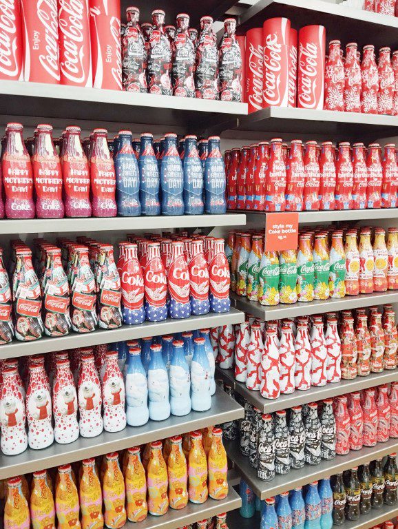 Different Coke bottle designs at Coca-Cola Store at World of Coca-Cola Atlanta Georgia